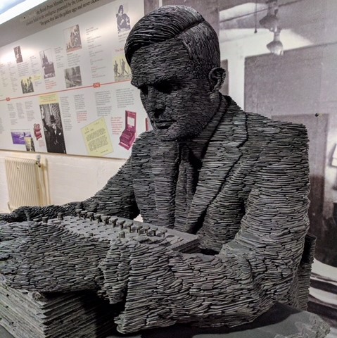 Statue of Alan Turing made of slate