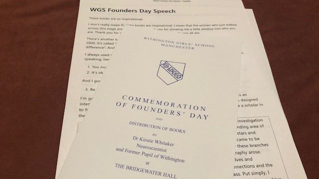The event programme and sheets of paper with Kirstie's speech in the background.